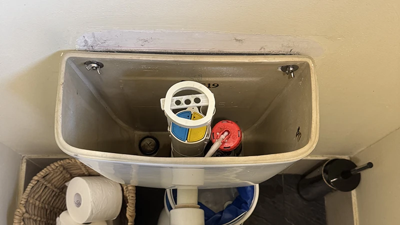 Broken flush button on toilet